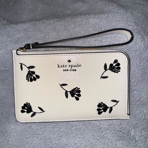Kate Spade Ivory Wristlet with Black Floral Pattern